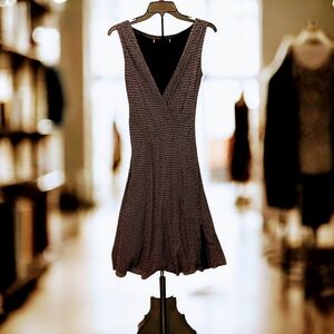 Fun Flowy mid length dress, Surplice Neckline, Full Lining & Skirt that Swings!